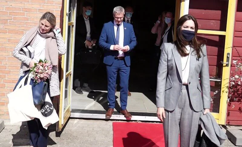 Crown Princess Mary wore a new checked wool-blend blazer, trousers suit from Alexander McQueen. Prince of Wales. Bottega Veneta