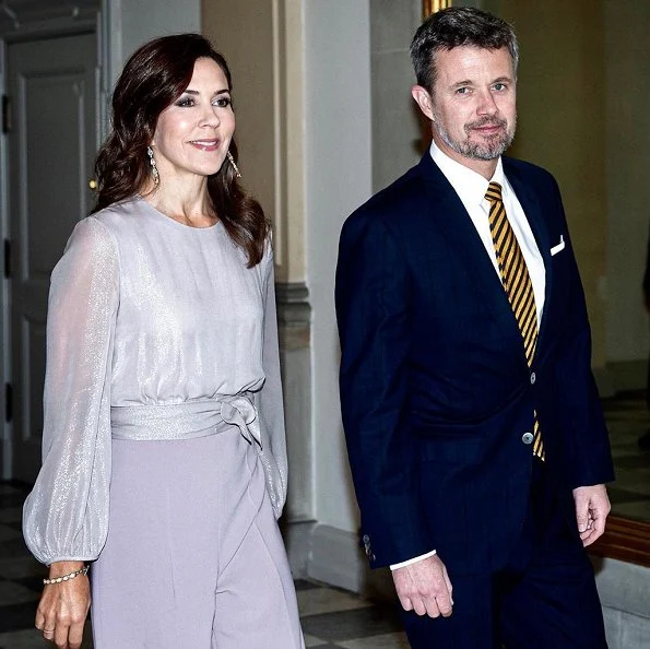 Crown Princess Mary wore Max Mara Leonida jumpsuit, Gianvito Rossi classic blush suede pumps, and carried Bottega Veneta knot clutch