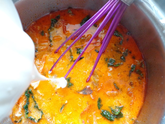 Whisk in sour cream and lemon juice