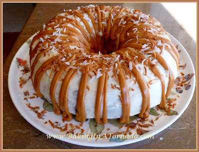 Pineapple Coconut Cake with Butterscotch Drizzle | recipe developed by www.BakingInATornado.com | #recipe #dessert