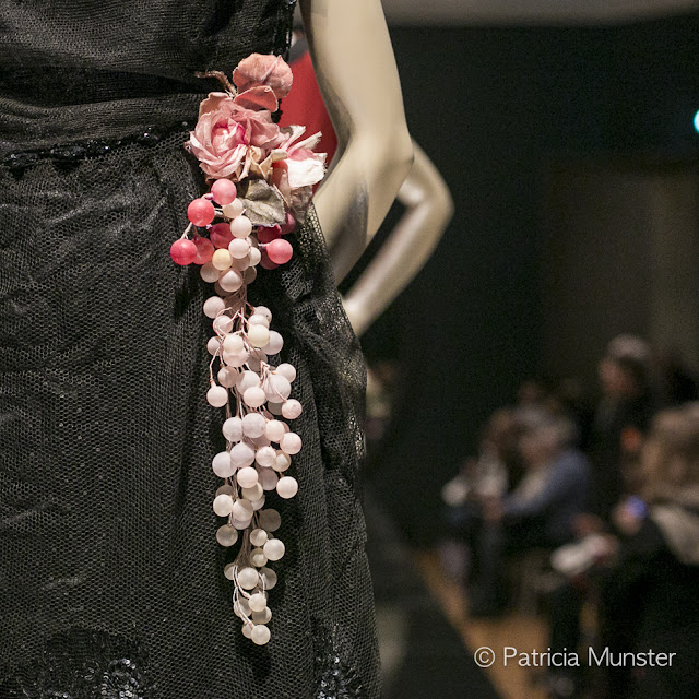 Corsage of silk velvet flowers and glass grapes