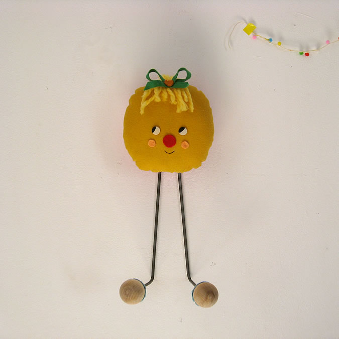 collectible figurines with big heads crossword