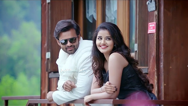 Tej I Love You (2018) is an Indian Telugu romantic film directed by A. Karunakaran in 2018. The film is produced by K.S. Rama Rao under the creative Commercials banner. The film is starred by Sai Dharam Tej and Anupama Parameswaran in the lead roles and Jayaprakash, Pavitra Lokesh, Anish Kuruvilla, Surekha Vani, Prudhvi Raj and others in some important roles. But here, the roles of Sai Dharam Tej and Anupama Parameswaran are very important.   Sai Dharam Tej and Anupama Parameswaran in Tej I Love You (2018) Movie    What a romantic drama film! I have watched several times this movie for its outstanding romance between Tej and Nandini. Here Sai Dharam Tej plays role as Tej. Not only in this movie but also in other acted movies, he plays his role as named Tej. I think it would be very easy to memorize the character in the same name. But the same names in different movies will help to misunderstand the audiences. However, Anupama, here plays her role as Nandini, a beautiful, talented young girl. Anyone will propose any time because they won’t miss the moment. Bu in the movie, Tej is a person of some different kind character. He also falls in love at the first sight in the running train. But Nandini (Anupama) has bluffed him disguising her as blind girl. Here, a kind of sympathy is created in his mind. But when he saw her walking fast towards him without glass, he understood her bluffing. Then what would happen? In films, actually at first, quarrelling, and no tolerance to each other etc will happen. In this movie, these things also happened. But romance comes when they think their relationship is strong and trustworthy. But all are ended when Nandini conduces an accident. She loses her memory but for an indefinite duration. She can memorize her father, her mother but her mother is died which she cannot remember. Why does she come in India from London? She cannot remember. So, Tej thinks all are ended as she has forgotten their former relationship and he do not know that whether she accepted his love or not. Crazy Boys Music Troops of India is Tej’s band group. Nandini loved music from childhood. So, she joined in their group. Tej’s friends tried her many to memorize her love but in vain. Nandini came to know from coach Murthy that whom she came to find in India is Tej. Actually, Tej rescued her mother in childhood from two goons and one is killed by him. He had to spend 7 years in jail. He has to stay far away from his aunty and uncle for protecting his pregnant cousin getting married to her lover. Nandini’s mother wanted to give property to Tej for rescuing her life. She knew that he had to spend seven years in jail for protecting her life. But Nandini’s father has always wanted to keep the property to him. The documents of the property, Tej did not take. In the last scene when Nandini and her father were at the airport, Nandini came to know that she proposed Tej with giving a letter and latter a digital pen in which she recorded ‘Tej I Love You’. Nandini returned to Tej.   Sai Dharam Tej and Anupama Parameswaran in Tej I Love You (2018) Movie    It is a romantic drama film for the audiences to get entertainment. I mean Sai Dharam Tej’s most of the movies are of action genre. But it is a romantic and attractive drama film, a decent film. All members of a joint family can watch it without any hesitation because it has no indecency. I like the film in this perspective that its story is a creative work. I have watched over thousands world cinemas. But unique story is rare in those movies. But it is a unique story. Not only it but also most of the south Indian movies are unique in story or styles. When I differentiate these south Indian movies with Bangladeshi movies, I don’t find any uniqueness in Bangladeshi films. Present movies of Bangladesh are not suitable for watching with joint family members and there is no unique story in these films. Sometimes, the directors copy posters, sometimes story, sometimes several scenes from other movies. I appreciate Sai Dharam Tej and Anupama Parameswaran’s performance.    Sai Dharam Tej and Anupama Parameswaran in Tej I Love You (2018) Movie    It is natural, sometimes romantic, sometimes dramatic acting and natural dialogues. No action, only romance is here in the movie. What is the purpose of film? Entertainment, entertainment and entertainment? No, never, not only entertainment but also it may have education, knowledge, news. A great factor is news. You are an audience. You watched a film and you may have news that means knowledge that you did not know before. I have got three kinds of news in this film compelling a girl to smoke, taking sign in a blank document to use personal purpose and recording words into a pen. A person can know a matter but others may not and others can know an issue but a person may not.  Watch the full movie 'Tej I Love You' (2018) here...