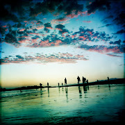 Venice Beach. I uploaded a bunch of new images to photoshelter, . (low tide high clouds on venice beach)