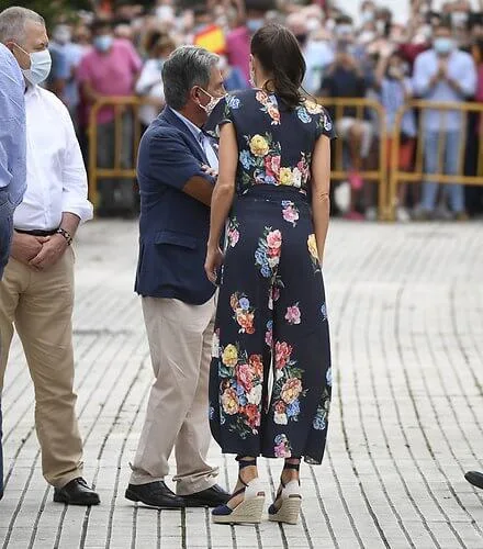 Queen Letizia wore a floral jumpsuit from Uterque, which she had worn before, and espadrille wedges from Macarena