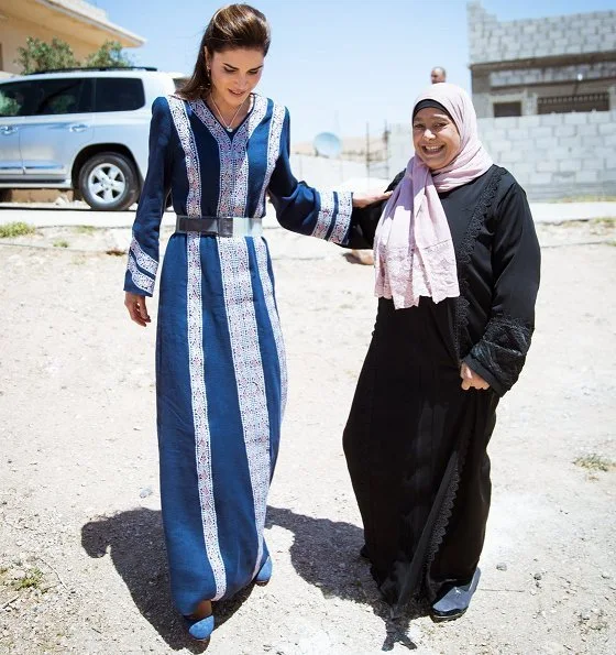 Queen Rania of Jordan wears Basmet Al-Khair Charitable Society' traditional Jordanian dress. Queen Rania wore Talitha Salma embroidered dress