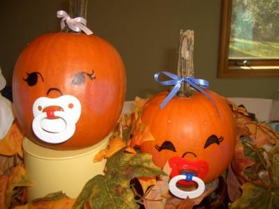 You can create a pumpkin cake with a baby popping out.