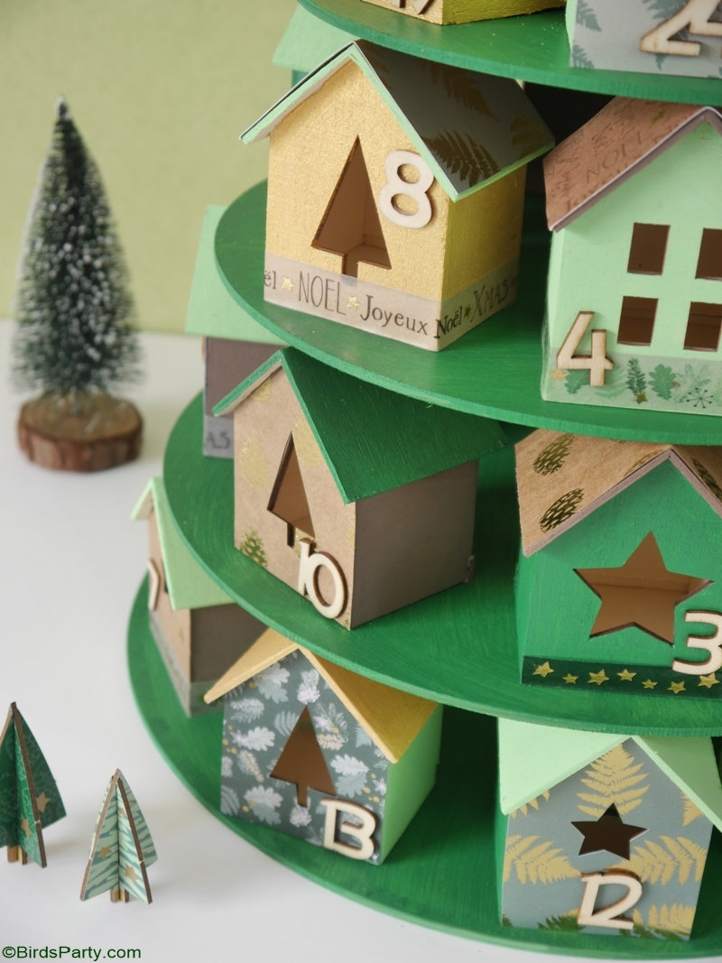 DIY Christmas Village Advent Calendar - easy, inexpensive and super pretty craft ideas to make with the kids for Christmas! by BirdsParty.com @birdsparty #adventcalendar #christmasvillage #christmas #christmascrafts #diy #crafts #holidaycrafts