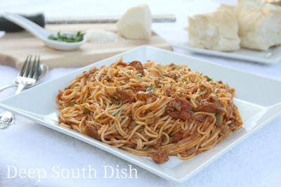 A spaghetti meat sauce made with the trinity and thin slices of spicy, andouille sausage, for a taste of the Deep South.