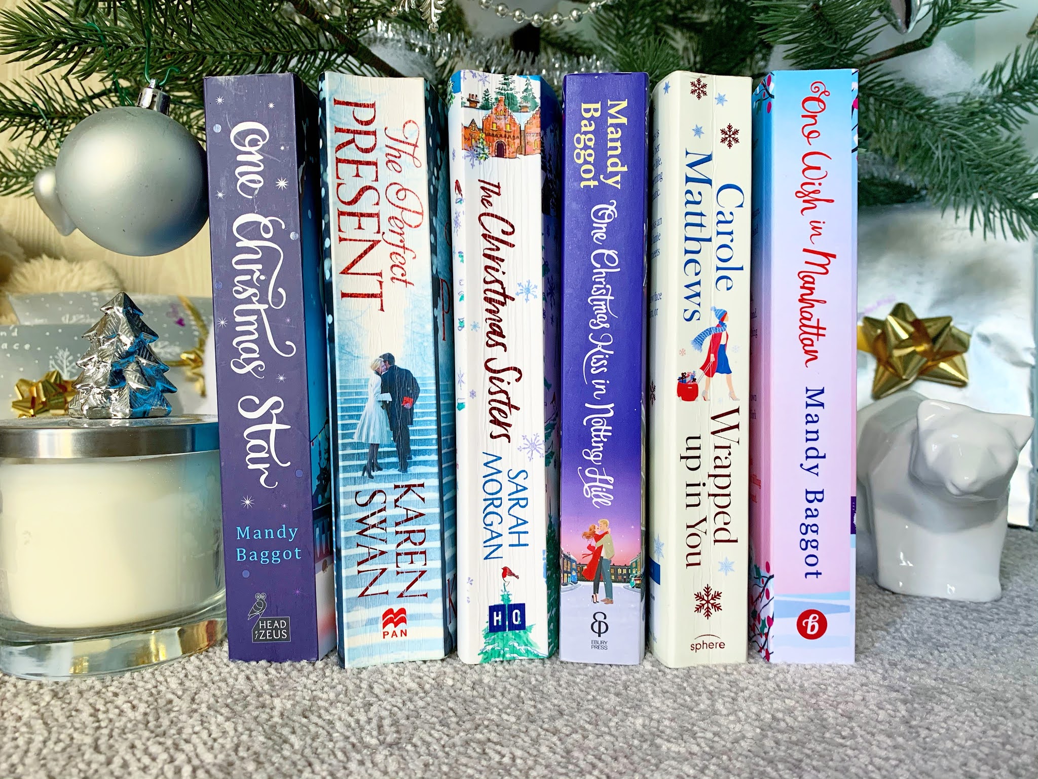 6 Christmas Themed Books under a Christmas Tree