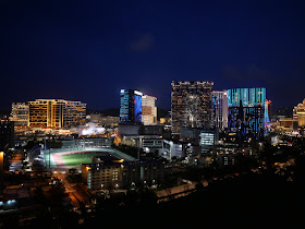 view of the Macau University of Science and the Morpheus hotel from the Grand Taipa Hiking trail at night