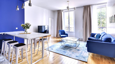 Paredes pintadas con efecto geométrico en un apartamento de 75 m2