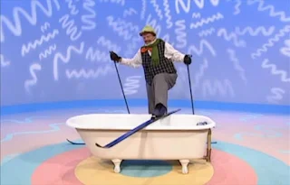 Mr Noodle comes with a ski attire. He can't take a bath like that. Sesame Street Elmo's World Bath Time The Noodle Family
