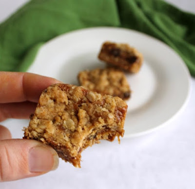 Layers of buttery oatmeal cookie sandwich a layer of caramel and chocolate chips. These bars are a must have for the holidays or any time your sweet tooth begs for something special. bite missing from a carmalette bar