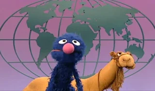 Global Grover wants to ride a camel named Sidney to go to school. Sesame Street Episode 4071