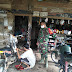 Bintara Pembina Desa (Babinsa) Koramil 426-02 Menggala, Kampung Aji Jaya KNPI, Serda Siswanto bergotong royong bantu warga renovasi rumah, 