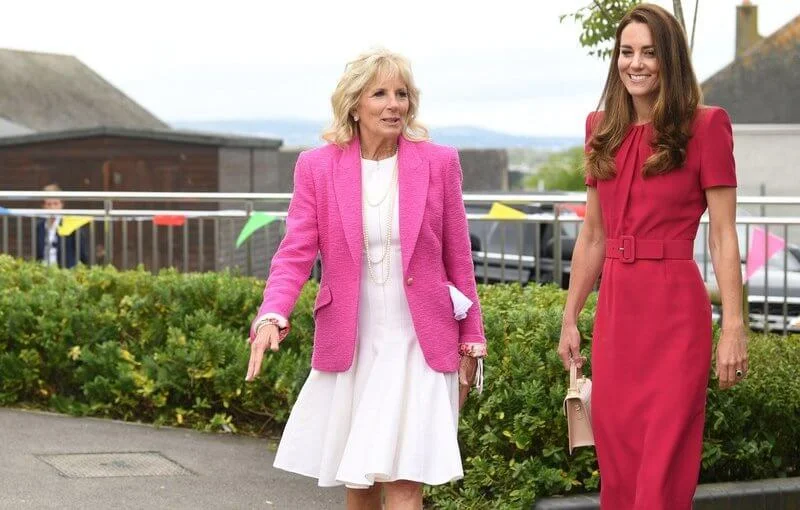 Kate Middleton wore a new midi pencil dress from Alexander McQueen. US First Lady Jill Biden wore a pink tweed blazer from L'agence