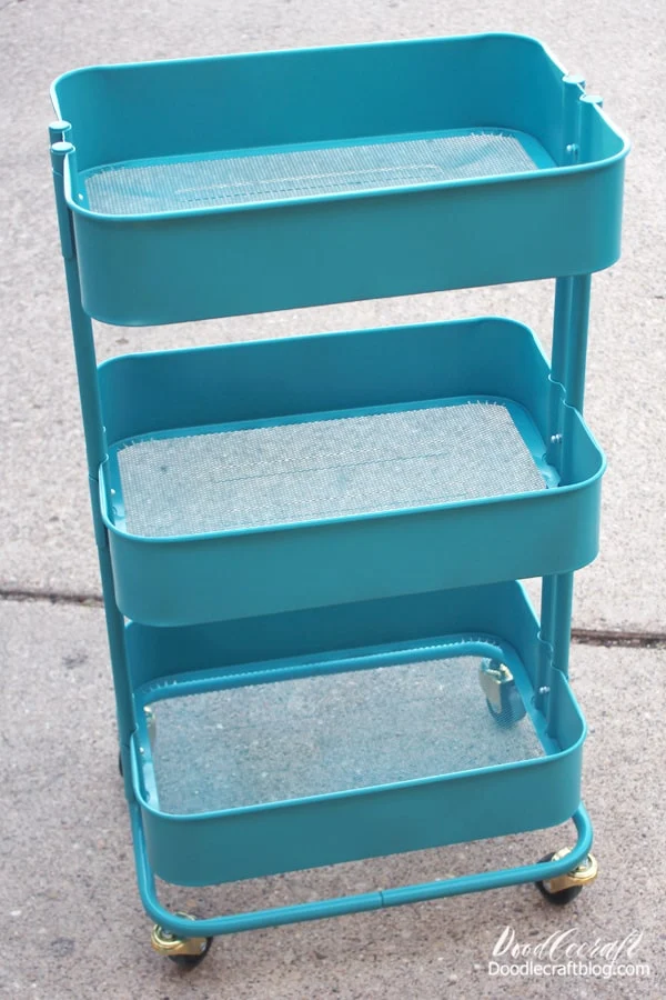 Rolling Storage Cart painted mermaid teal with Colorshot paint and used for storing craft supplies