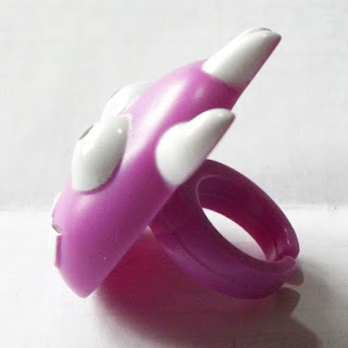 Purple plastic monster ring with googly eyes  from Greggs