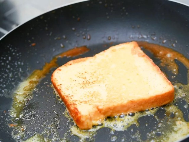 frying a slice of bread