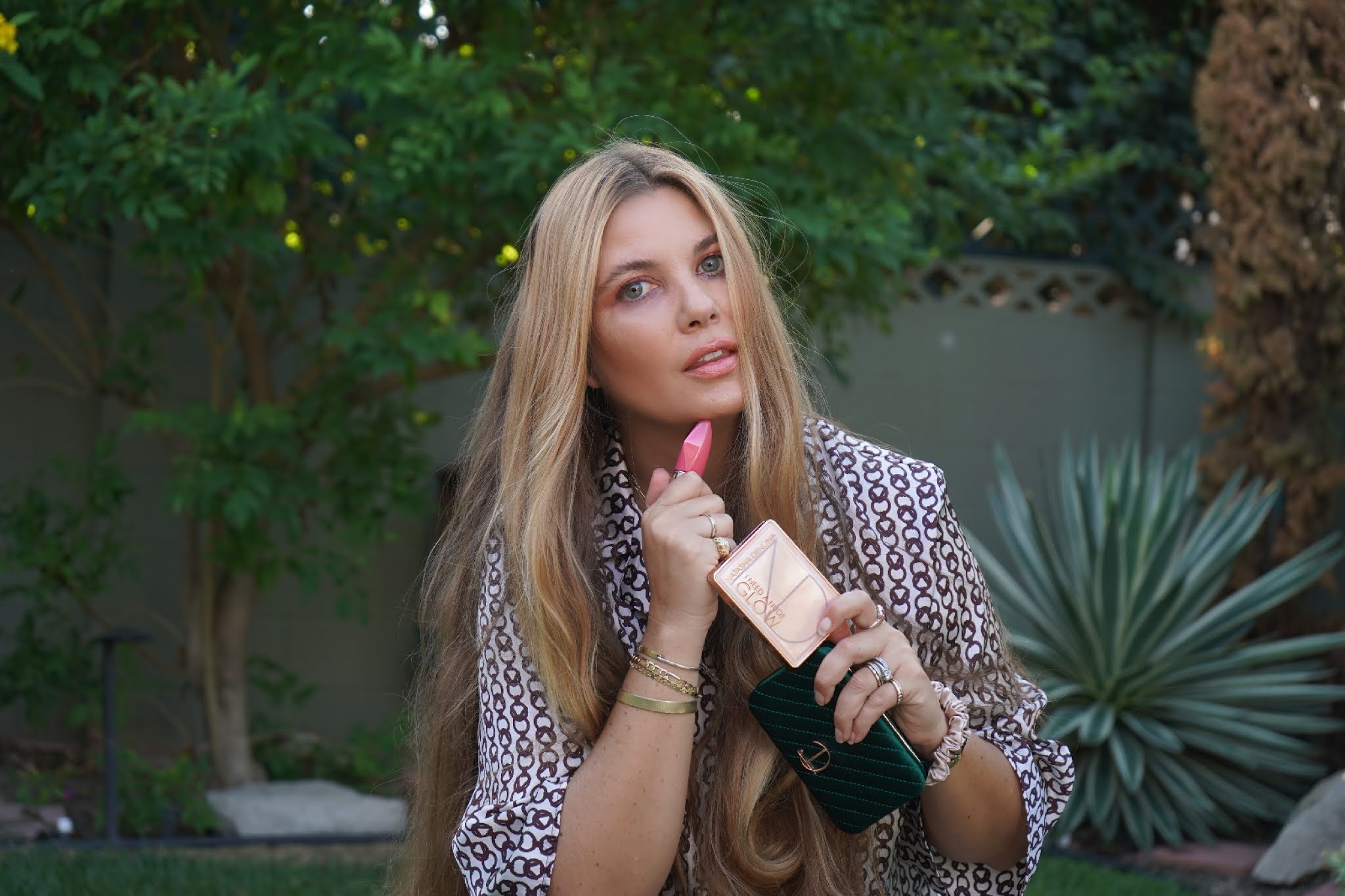 woman holding makeup she got from Beautylish Gift Card