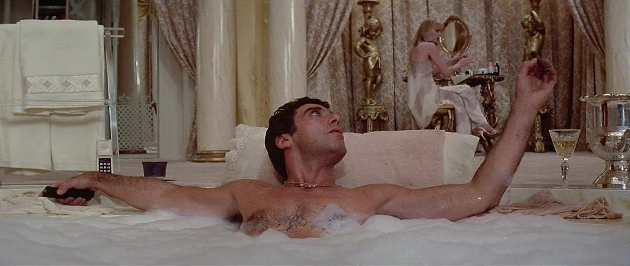 Al Pacino shirtless in Scarface.