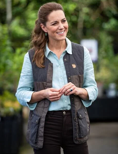 Kate Middleton wore Fjallraven Sormland vest, Jaeger linen shirt, Massimo Dutti satin trousers, Superga sneaker, Monica Vinader earrings