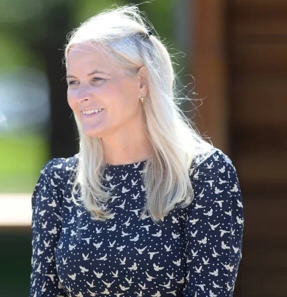 Crown Princess Mette-Marit wore a birds flying print dress from Pia Tjelta, and beige flats from Christian Louboutin