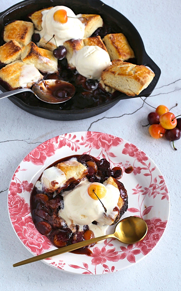 Cherry-Cobbler-with-Cream-Cheese-Biscuits-1 Recipe for a cherry cobbler, baked with a cream cheese biscuit top.