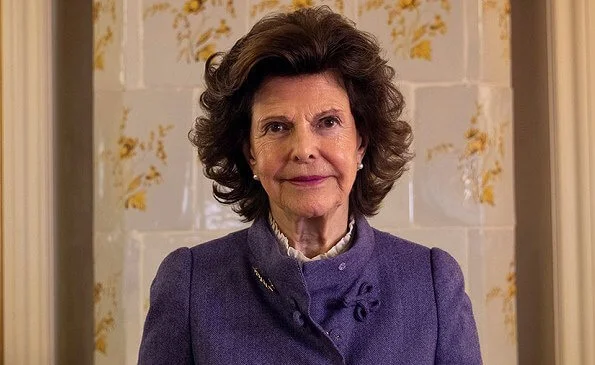 Queen Silvia of Sweden digitally inaugurated Barnahus Jämtland. The Barnahus (Childrens House). The Queen wore a purple suit blazer