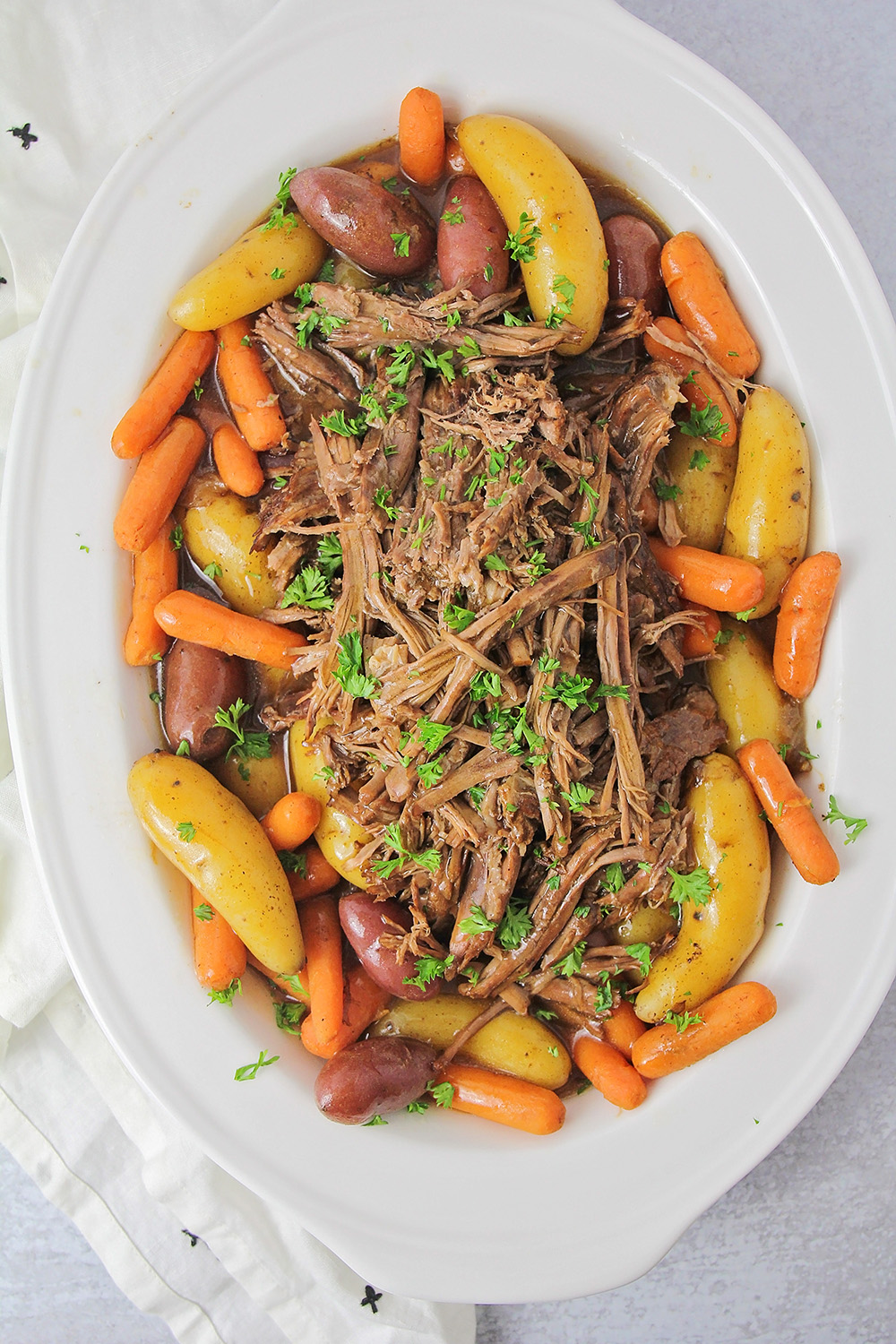 This tender and juicy Instant Pot pot roast is so easy to make, and so flavorful! It's a time-saving way to make a delicious roast!