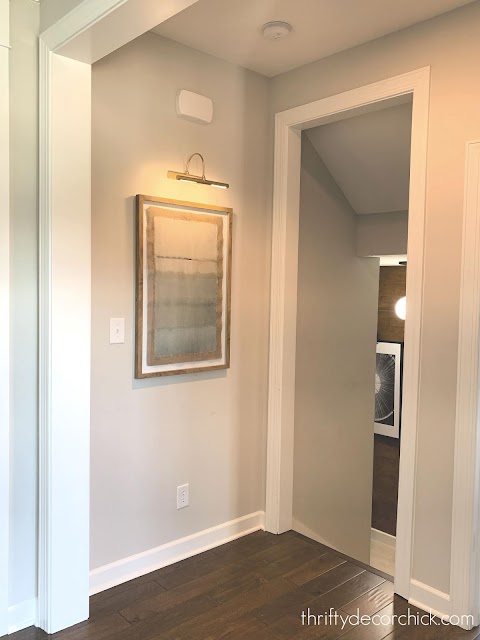 small hallway off basement stairs