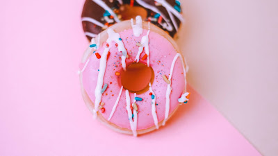Donuts, dessert, sweets, pink background Donuts, dessert, sweets, pink background
