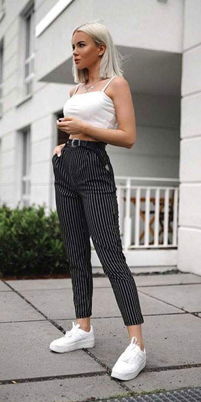 Looking forward to walking your workspace with style? Check out these 24 Stylish Summer Work Outfits for Women that are Office-friendly. Work Wear via higiggle.com | crop top+ pants | #summeroutfits #office #workoutfits #pants