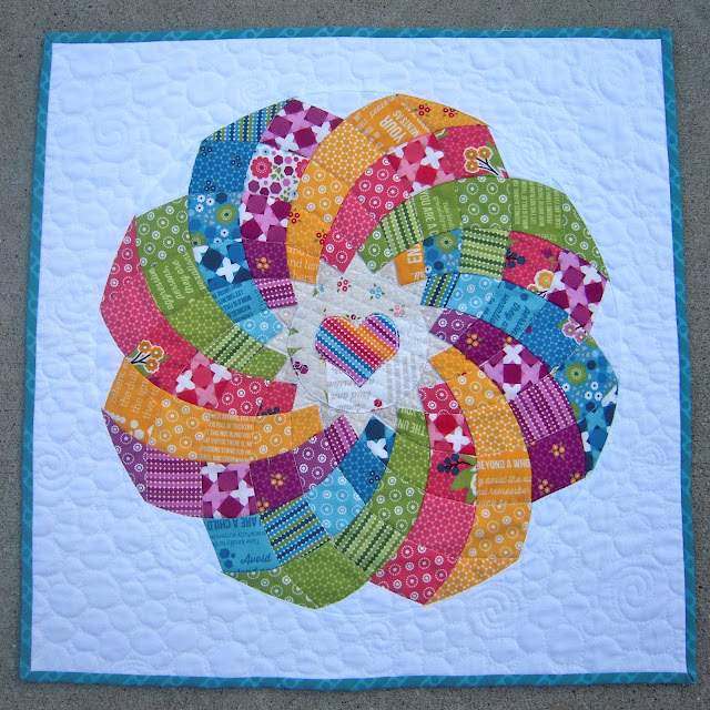 http://sewinsomethin.blogspot.com/2015/10/bloggers-quilt-festival-spinning-dahlia.html