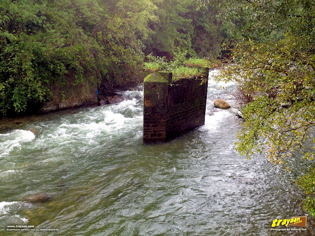 Remains of an old bridge across a stream near the Shiradi Ghat National Highway NH-48 (New No.: NH-75) through Western Ghats, Karnataka