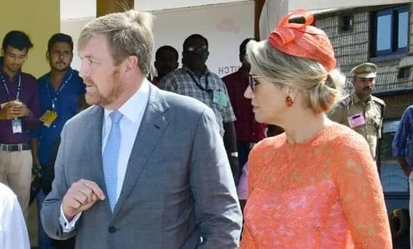 Queen Maxima wore a lace midi dress by Natan, Queen wore a Natan pumps and Ole Lynggaard diamond earrings