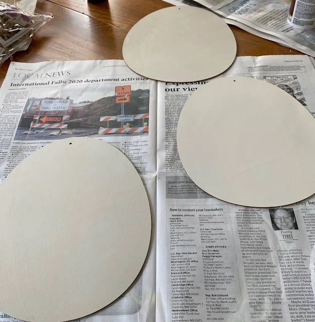 Photo of three Easter egg cutouts painted off white