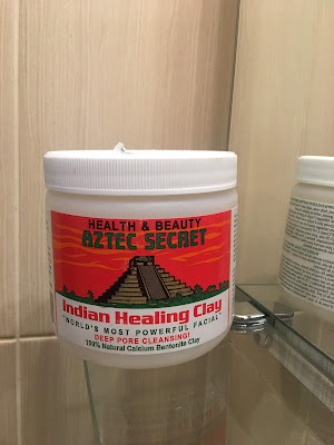 Indian Aztec clay powder in a bowl for a hair mask.
