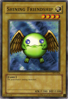 Yu-Gi-Oh card Shining Friendship with description, attack and defense power