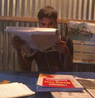 Reading Newspaper