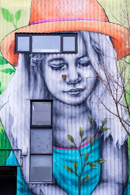 soulful street art, graffiti, East London, girl with tree sapling