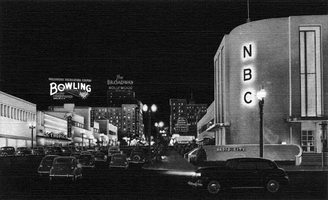 Vintage Postcard view Vine Street at Sunset Boulevard. The newly constructed NBC Radio City at night. Jingles and other stories of The American Dream. marchmaton.com Vintage Postcard view Vine Street at Sunset Boulevard. The newly constructed NBC Radio City at night. Jingles and other stories of The American Dream. marchmaton.com