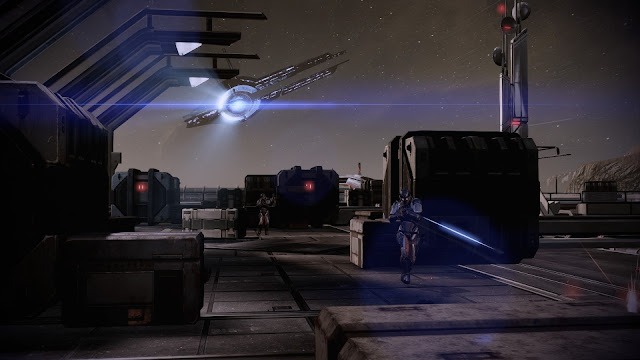 Screenshot of Shepard approaching a Mass Relay in Mass Effect 2's Arrival DLC