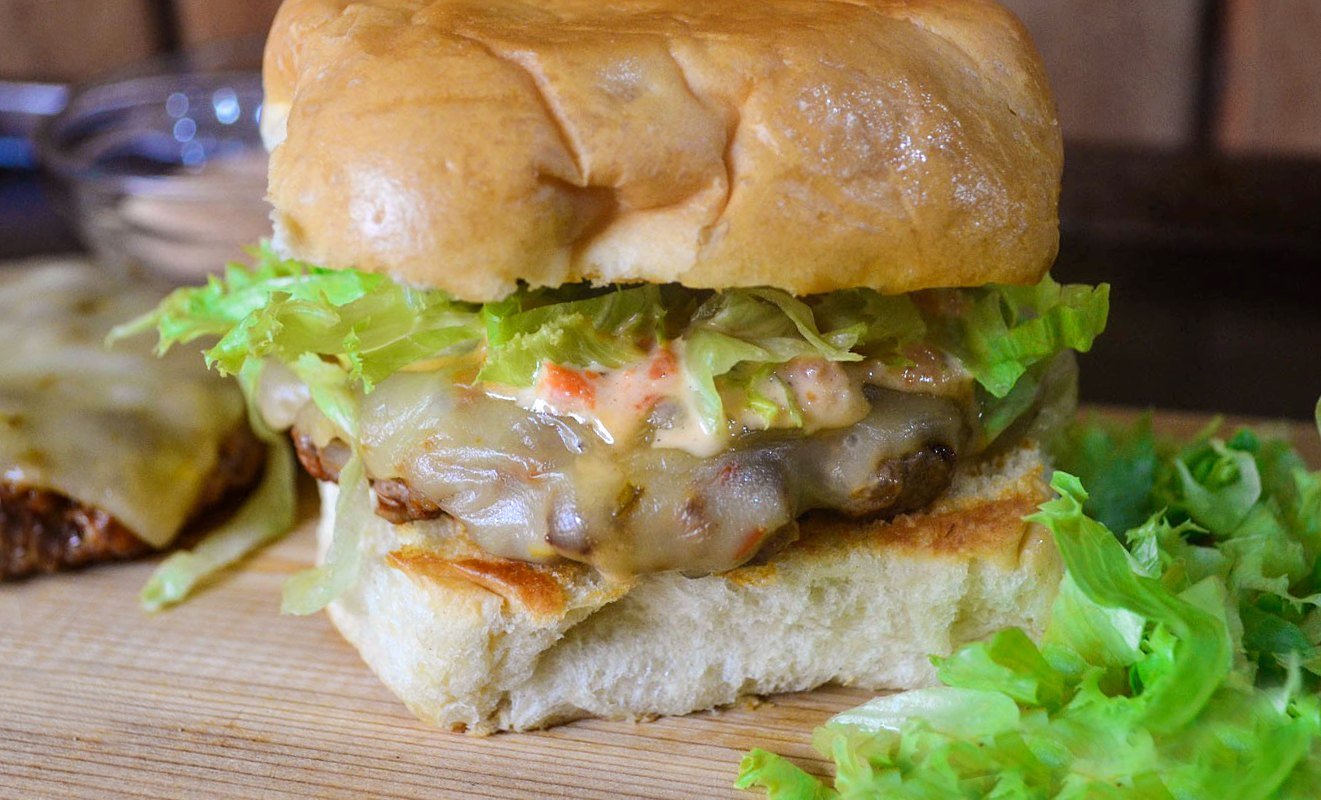 Greedy Girl Jerk sausage beef burgers with a roasted red pepper mayo