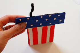 stick pipe cleaners into your cardboard Fourth of July Hat bottom