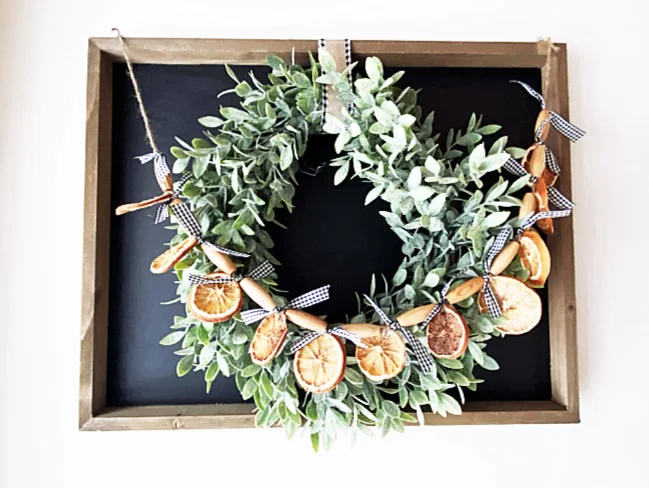 orange slice garland on a wreath