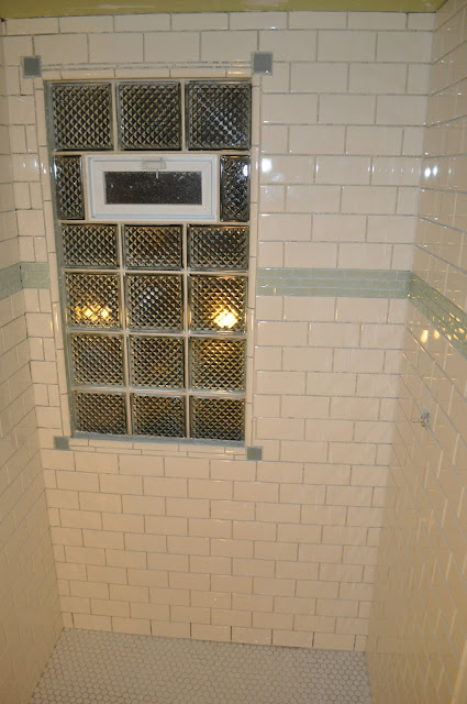 bathroom, reno, subway tile, sea glass tile, glass tile, white grout, grout, glass block window, 