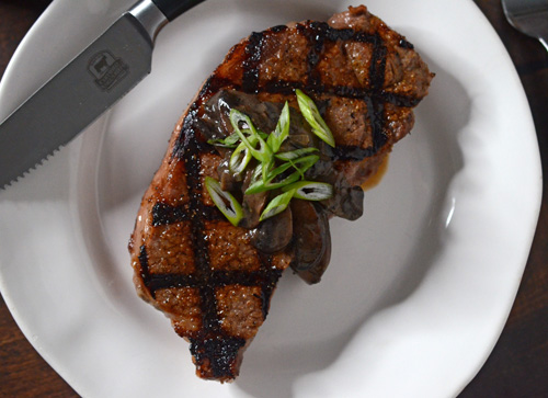 Certified Angus Beef Brand USDA Prime Strip Steak with portobello flambe.