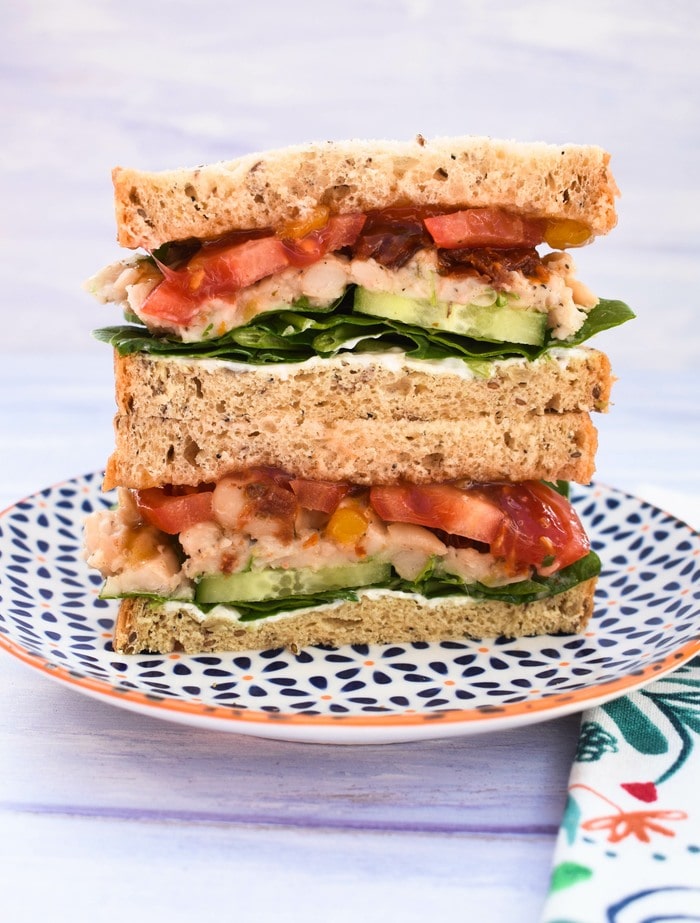Italian white bean and tomato sandwich recipe An italian white bean sandwich stacked high with lots of fillings